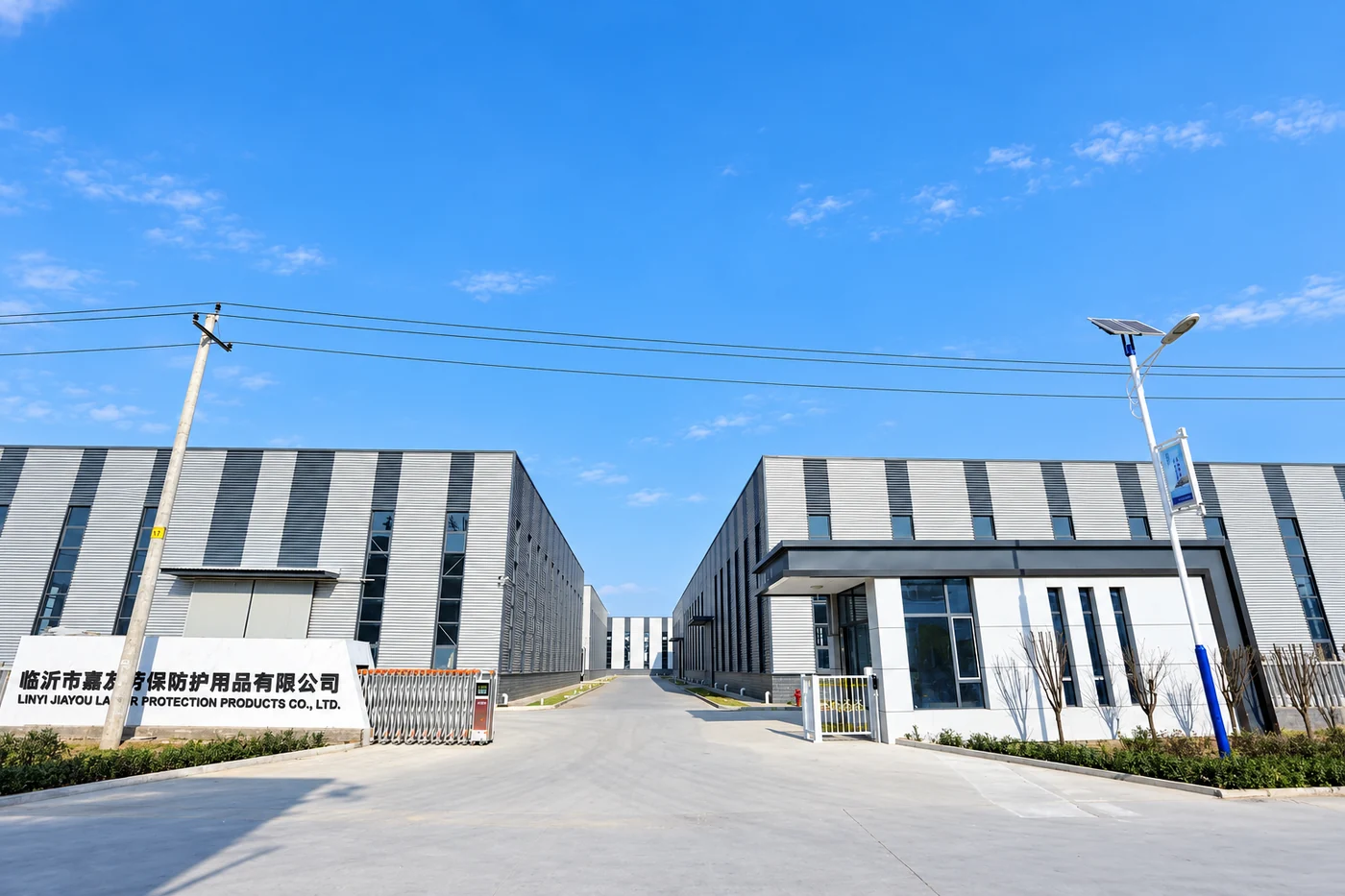 Jiayou factory entrance and manufacturing buildings in Linyi, enhanced from the supplied photograph